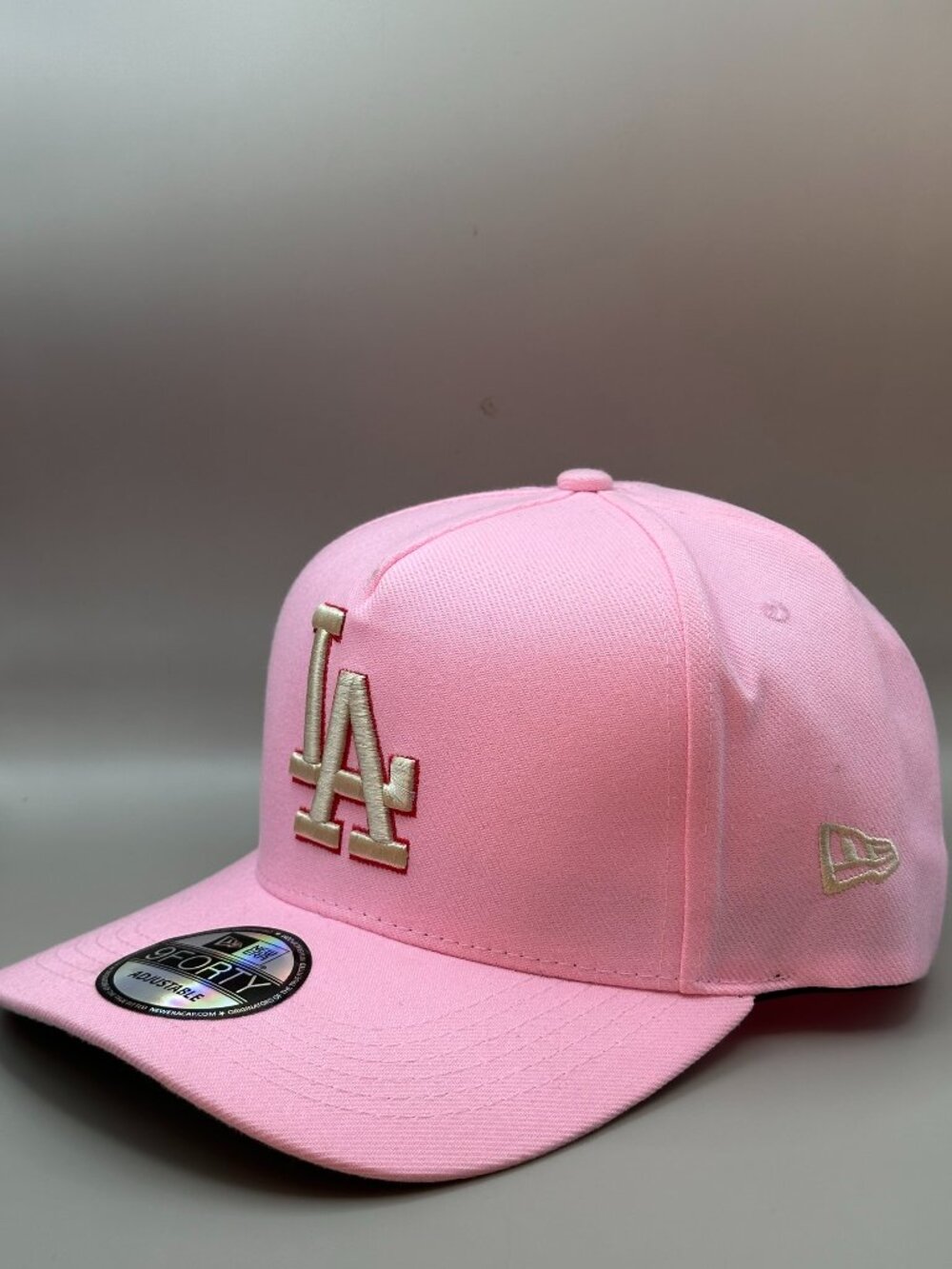 New Era LA 9FORTY Adjustable Cap – Pink – Gold Embroidered Logo